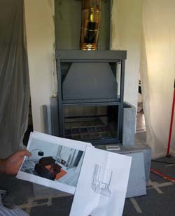 Thermalux being used to install a double sided inset stove