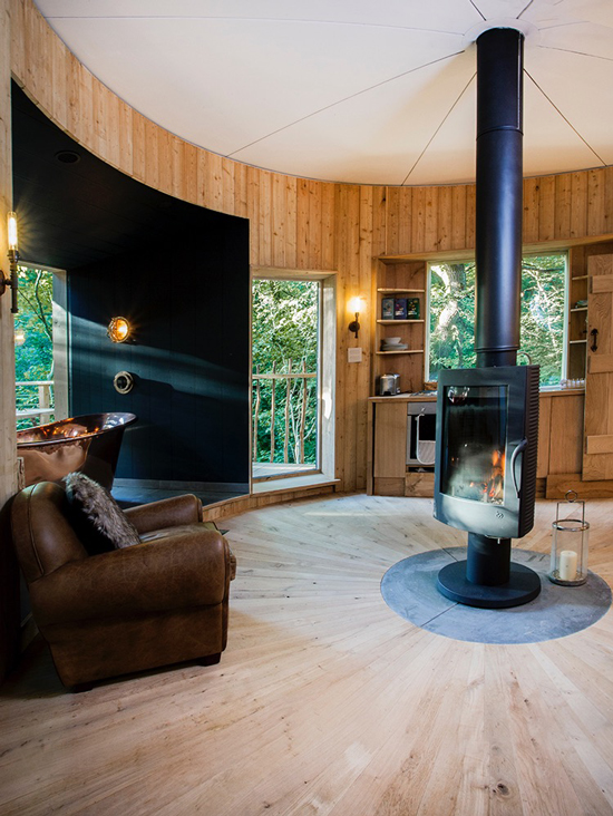 The Invicta Pharos Rotating Stove has been installed in this incredible Woodsman Tree house